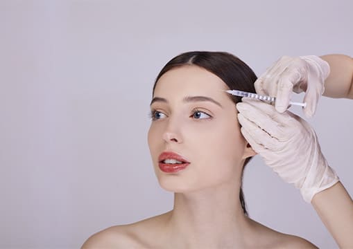 Aplicación de toxina botulínica (botox)